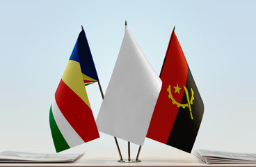 Flags of Seychelles and Angola with a white flag in the middle