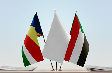 Flags of Seychelles and Sudan with a white flag in the middle