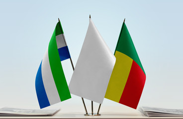 Flags of Sierra Leone and Benin with a white flag in the middle