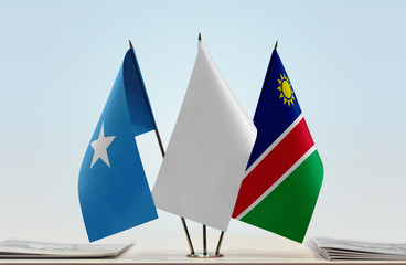 Flags of Somalia and Namibia with a white flag in the middle