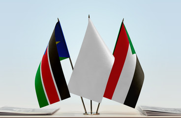 Flags of South Sudan and Sudan with a white flag in the middle