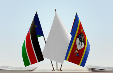 Flags of South Sudan and Swaziland with a white flag in the middle