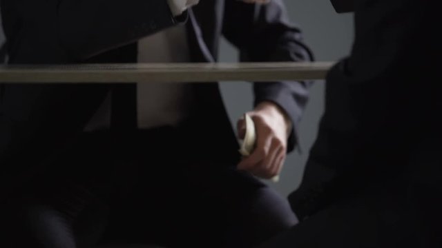 Partnership agreement based on corruption, business handshake in illegal deals