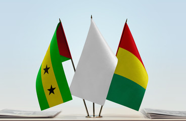 Flags of Sao Tome and Principe and Guinea with a white flag in the middle