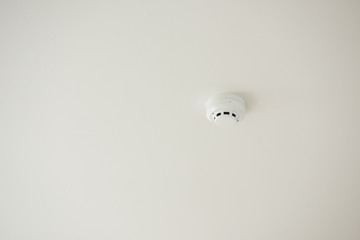 smoke detector and fire protection system on ceiling.