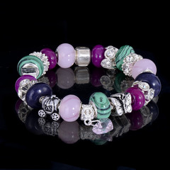 jewelry bracelet female glass crystal elements black background beautiful elegant multicolored...