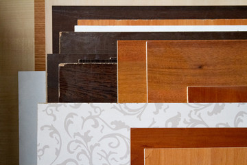 A pack of parts of a particleboard in the furniture manufacturing.