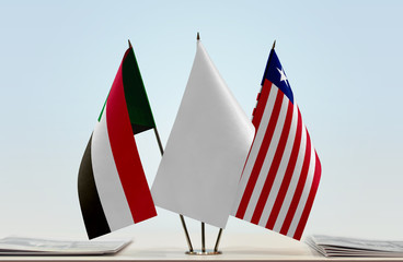 Flags of Sudan and Liberia with a white flag in the middle