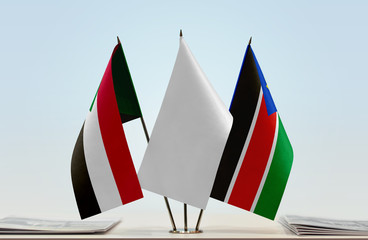 Flags of Sudan and South Sudan with a white flag in the middle