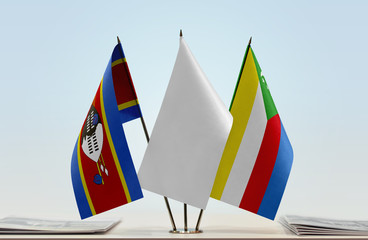 Flags of Swaziland and Comoros with a white flag in the middle