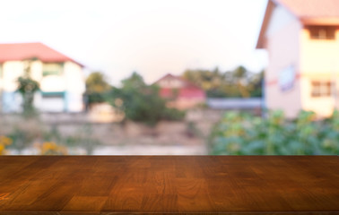 Empty wooden table in front of abstract blurred background of coffee shop . can be used for display or montage your products.Mock up for display
