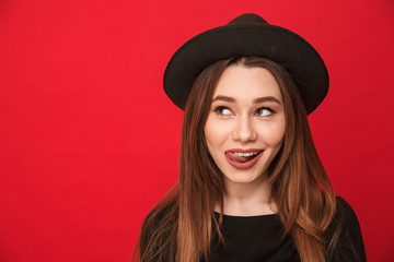 Fototapeta premium Happy young woman standing isolated