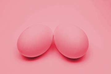 Pink egg on pink background