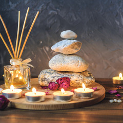 Spa composition-stones, candles, aromatherapy, dry flowers.