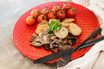 juicy steak veal beef meat with tomato and potatoes