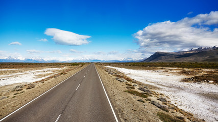 Road to El Chalten village with Fitz Roy Mountain range in background, Argentina.
