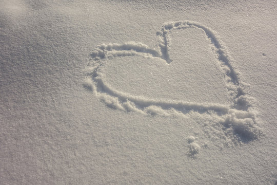 White snow with drown heart shape in Valentine's Day