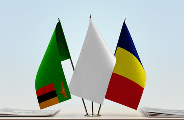 Flags of Zambia and Chad with a white flag in the middle