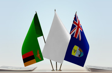 Flags of Zambia and Saint Helena with a white flag in the middle