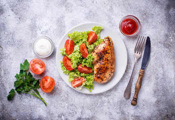 Grilled chicken breast with vegetable salad