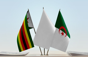 Flags of Zimbabwe and Algeria with a white flag in the middle