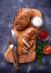 Grilled chicken breast or fillet on iron pan