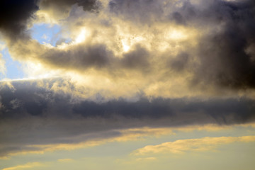 Clouds illuminated by the Sun in backlight.