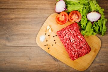 Raw Mincemeat on wooden board