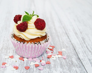 Cupcake with fresh raspberries