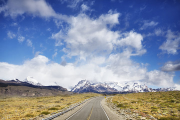 Road to El Chalten village with Fitz Roy Mountain range in background, Argentina.