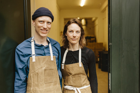 Couple standing outside gin distillery - Powered by Adobe