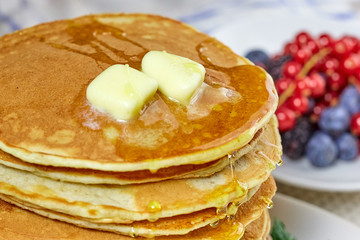 pancakes with melted butter and honey.