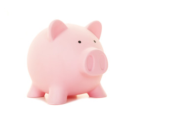 Pink piggy bank isolated on a white background