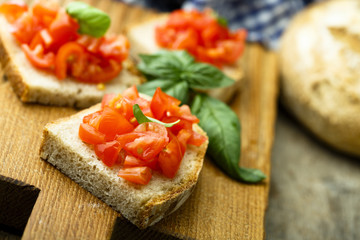 Basil and tomato bruschetta on homemade rye bread