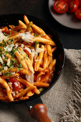 Pasta with tomato sauce in pan