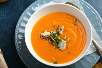 Traditional pumpkin soup with cheese