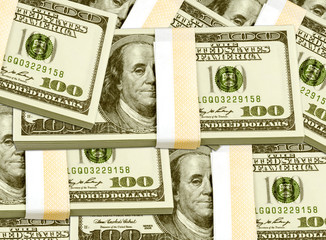 liasses de billets de 100 dollars