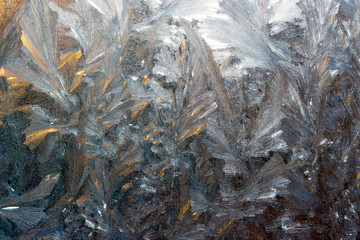 a window covered in frozen water