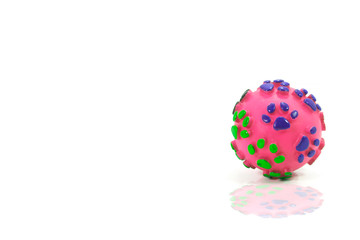 Rubber ball of pink for dog on isolated white.