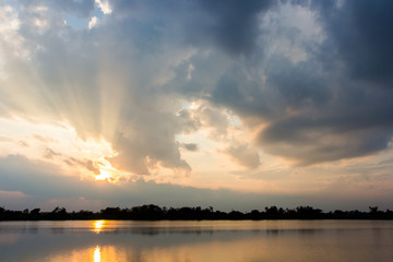 colorful dramatic sky with cloud at sunset.