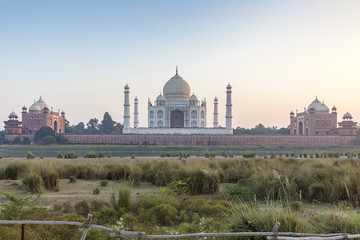 Fototapeta na wymiar Taj Mahal and outlying buildings as seen from across the Yamuna River (northern view), Agra, Uttar Pradesh, India
