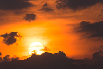 colorful dramatic sky with cloud at sunset.