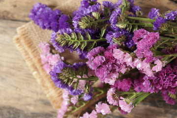 Top view, Static flowers on the wooden table
