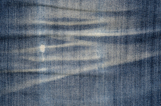 Texture of blue denim fabric.