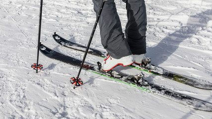 Detailed view of the ski bindings, Detailed view touring winter boots, is in motion.