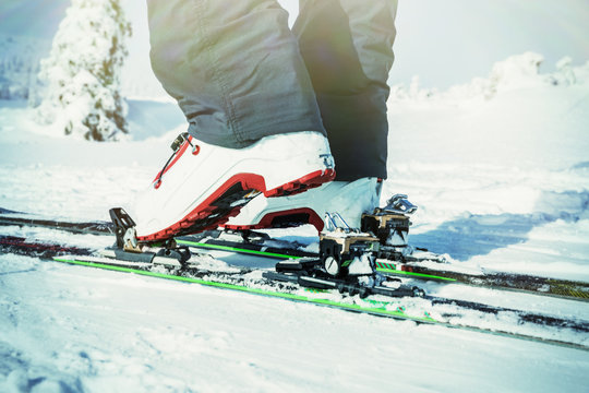 Detailed view of the ski bindings, Detailed view touring winter boots, is in motion.