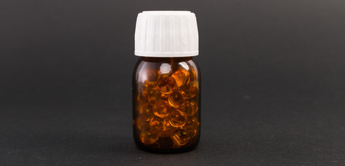 Bottle full of vitamin e capsules