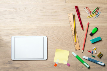 Blank tablet with copy space on desk from above