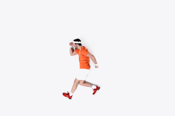 Fototapeta na wymiar top view of young man in sportswear running isolated on white