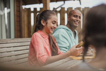 Young Girl Laughing at Brunch